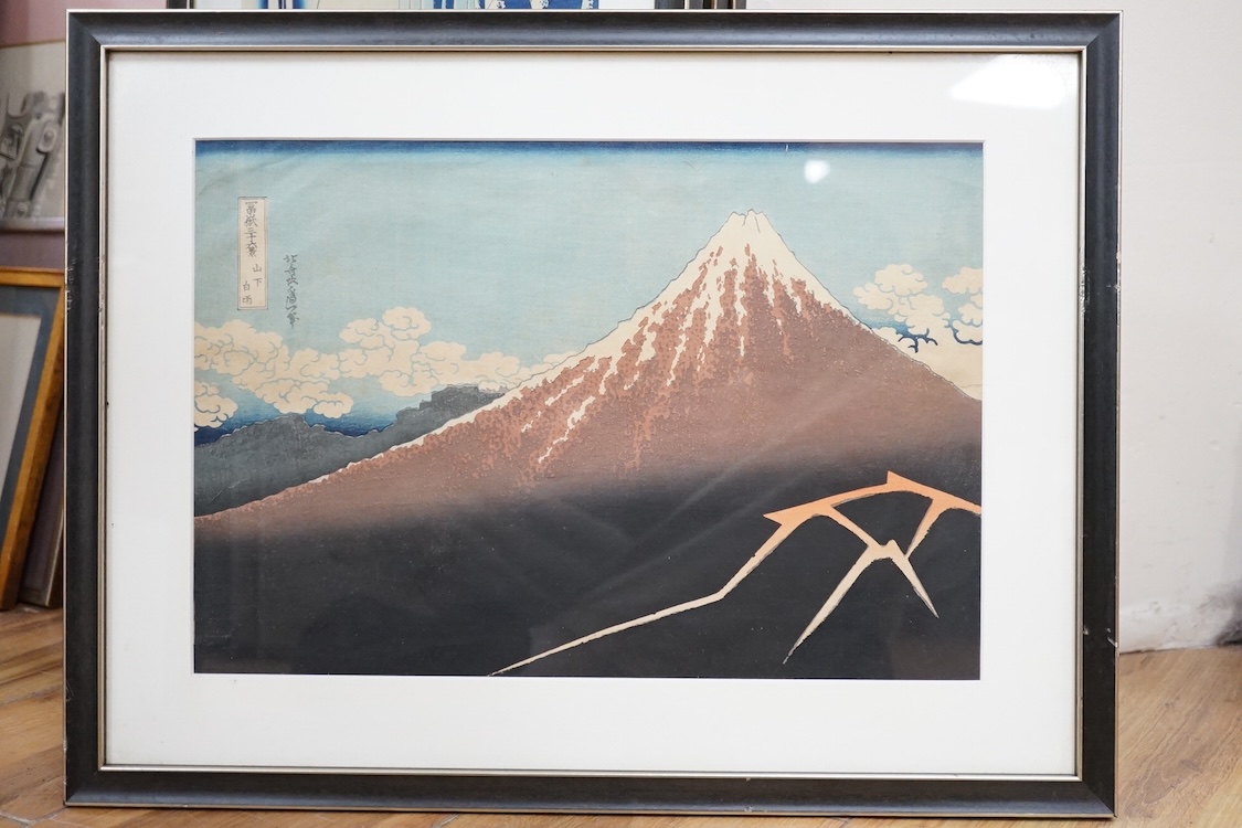 A set of ten Japanese woodblock prints to include ‘Great wave off the coast of Kanagawa’, ‘Fishermen at Kajikazawa’ and ‘Evening shower’, largest 25 x 36cm. Condition - fair